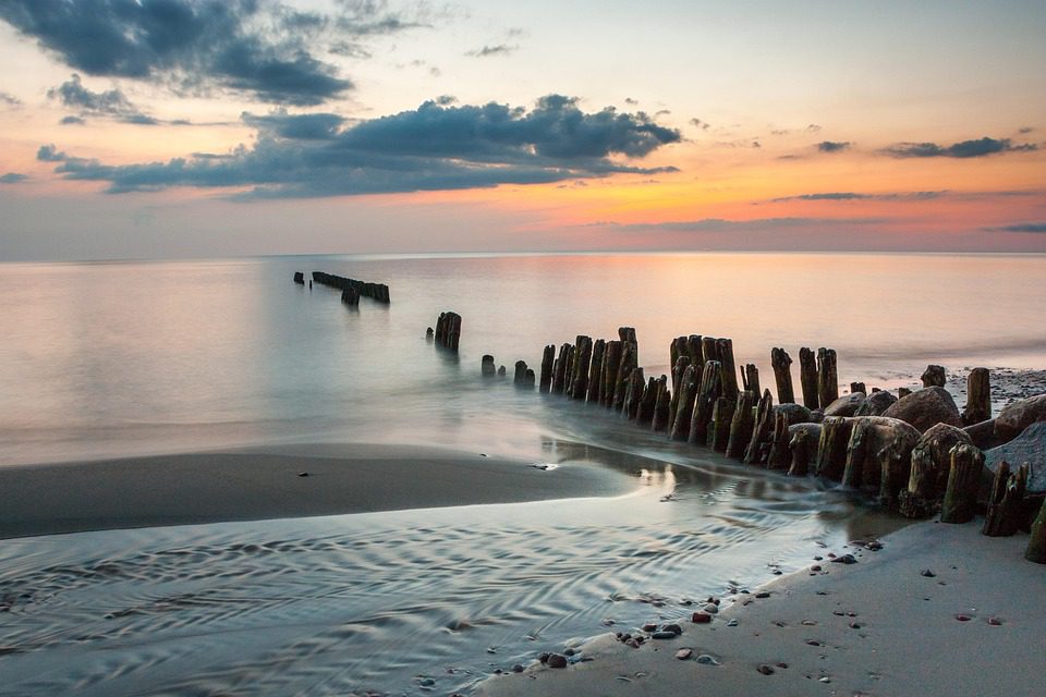 Baltic Sea at sunset with calm waters and colorful clouds