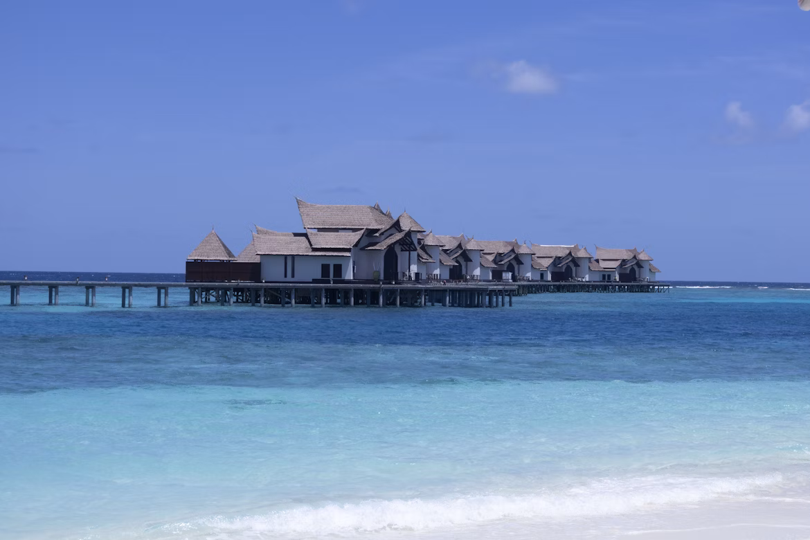 Overwater Bungalows in Maldives on a Sunny Day
