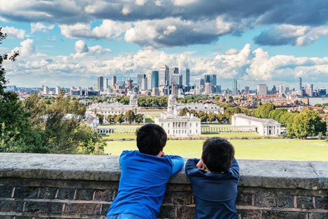 Two children looking out over Greenwich Park
