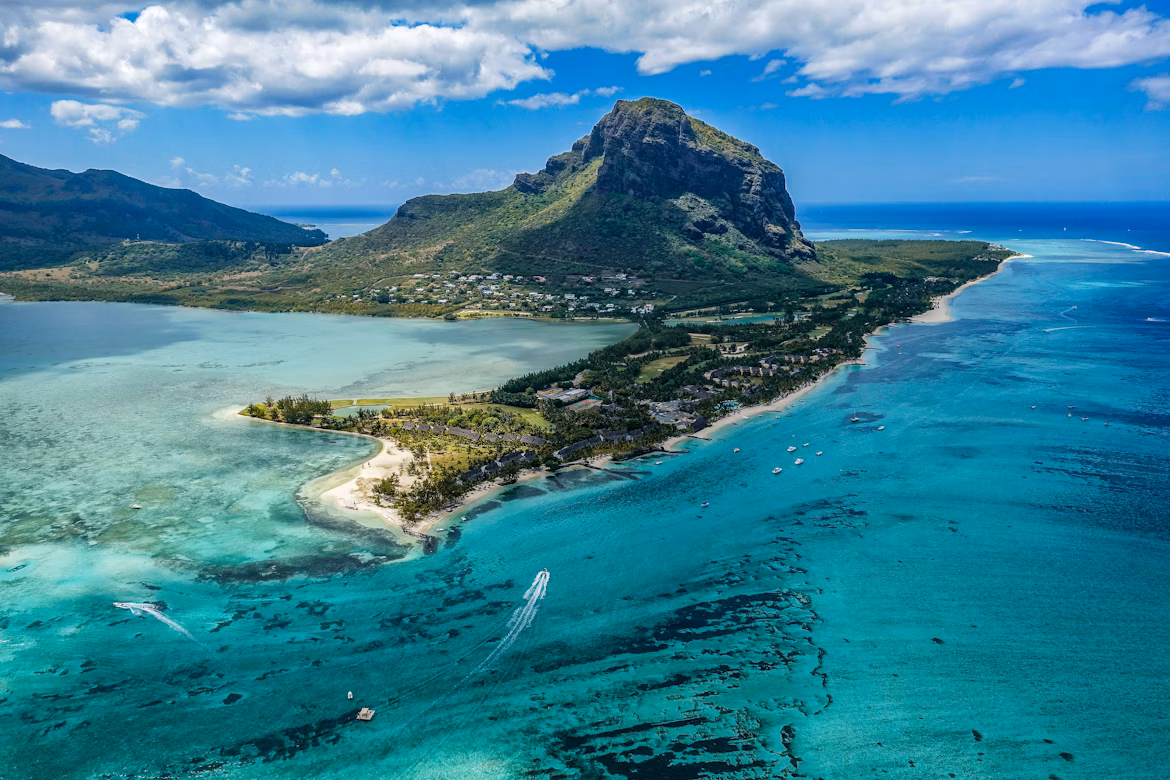 Tranquil beach with turquoise waters and palm trees in Mauritius during September
